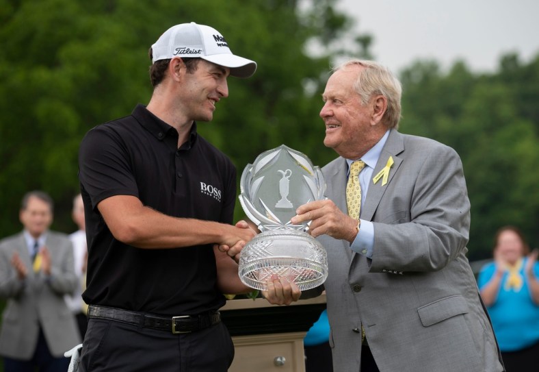 Patrick Cantlay receives the trophy for winning the Memorial Tournament from Jack Nicklaus following his playoff win over Collin Morikawa at Muirfield Village Golf Club in Dublin, Ohio on Sunday, June 6, 2021.

The Memorial Tournament Pga Golf