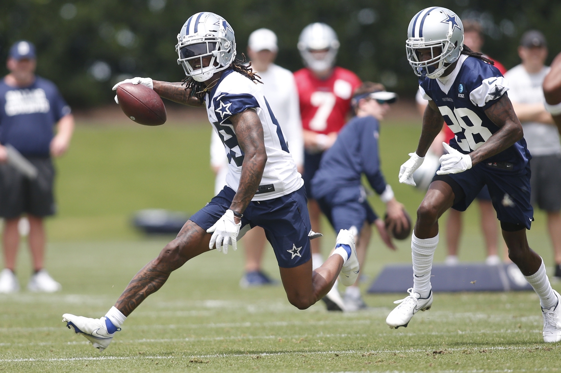 Jun 8, 2021; Frisco, TX, USA;  Dallas Cowboys wide receiver CeeDee Lamb (88) runs a drill against cornerback Maurice Canady (28) during voluntary Organized Team Activities at the Ford Center at the Star Training Facility in Frisco, Texas. Mandatory Credit: Tim Heitman-USA TODAY Sports