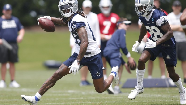 Jun 8, 2021; Frisco, TX, USA;  Dallas Cowboys wide receiver CeeDee Lamb (88) runs a drill against cornerback Maurice Canady (28) during voluntary Organized Team Activities at the Ford Center at the Star Training Facility in Frisco, Texas. Mandatory Credit: Tim Heitman-USA TODAY Sports