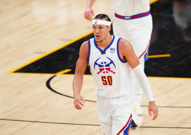 Jun 9, 2021; Phoenix, Arizona, USA; Denver Nuggets forward Aaron Gordon (50) against the Phoenix Suns during game two in the second round of the 2021 NBA Playoffs at Phoenix Suns Arena. Mandatory Credit: Mark J. Rebilas-USA TODAY Sports