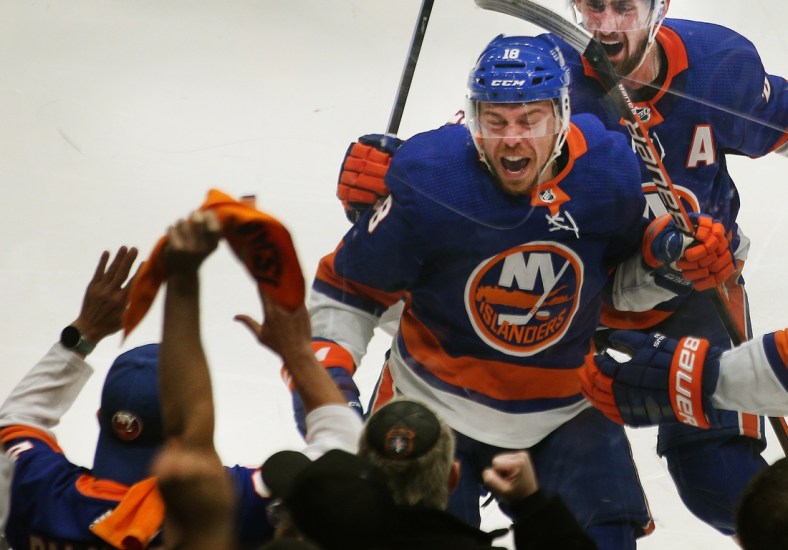 Jun 23, 2021; Uniondale, New York, USA; New York Islanders left wing Anthony Beauvillier (18) reacts after scoring the game winning goal against the Tampa Bay Lightning during overtime in game six of the 2021 Stanley Cup Semifinals at Nassau Veterans Memorial Coliseum. Mandatory Credit: Andy Marlin-USA TODAY Sports