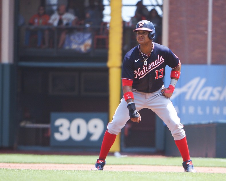 Jul 11, 2021; San Francisco, California, USA; Washington Nationals third baseman Starlin Castro (13) takes a lead off first base against the San Francisco Giants during the second inning at Oracle Park. Mandatory Credit: Kelley L Cox-USA TODAY Sports