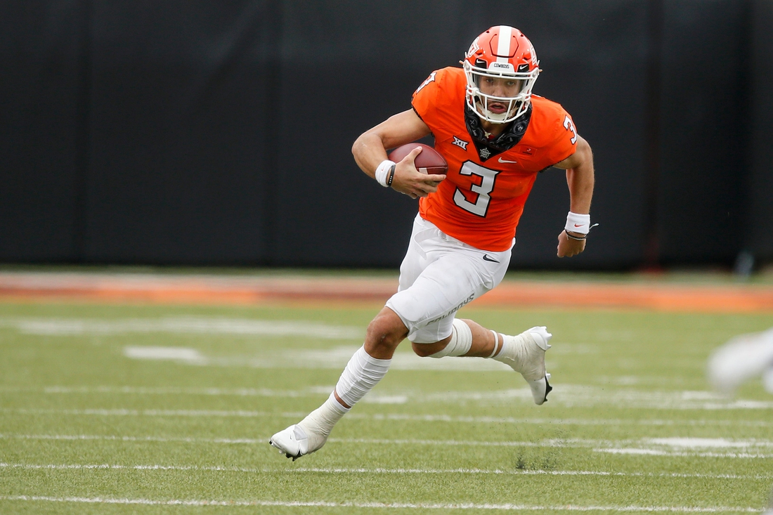 Oklahoma State Cowboys quarterback Spencer Sanders (3) scrambles during a game against Texas Tech last season.