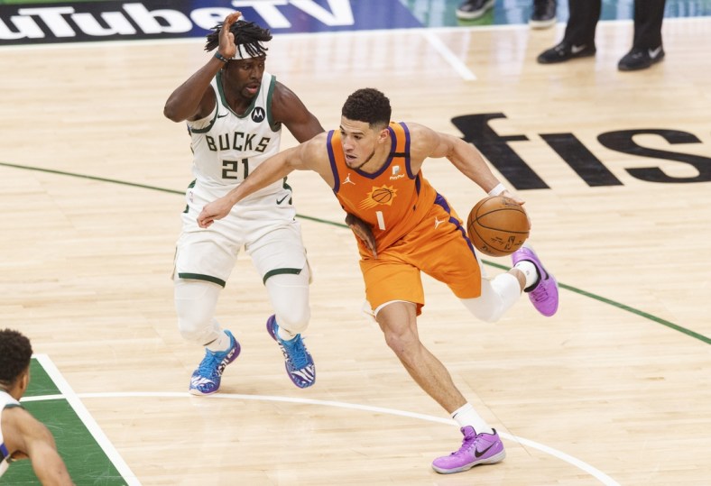 Jul 14, 2021; Milwaukee, Wisconsin, USA; Phoenix Suns guard Devin Booker (1) during game four of the 2021 NBA Finals against the Milwaukee Bucks at Fiserv Forum. Mandatory Credit: Jeff Hanisch-USA TODAY Sports