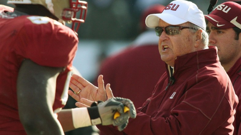 Jan. 1, 2010: Bobby Bowden congratulates his players as they leave the field following a third quarter touchdown during his final game against West Virginia at Jacksonville Municipal Stadium for the Gator Bowl. [Kelly Jordan, Florida Times-Union]