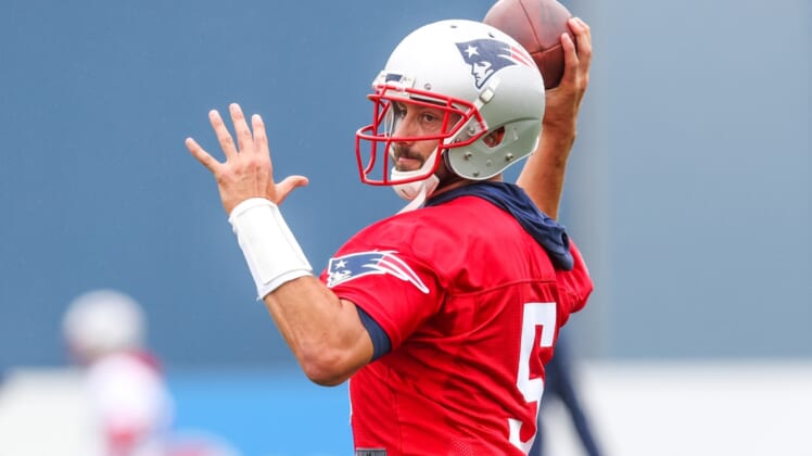Jul 28, 2021; Foxborough, MA, United States; New England Patriots quarterback Brian Hoyer (5) during training camp at Gillette Stadium. Mandatory Credit: Paul Rutherford-USA TODAY Sports