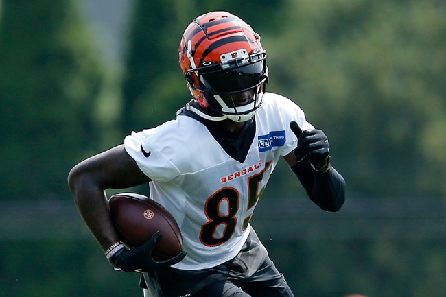 Cincinnati Bengals wide receiver Tee Higgins (85) runs with a catch during training camp practice at the Paul Brown Stadium practice facility in downtown Cincinnati on Thursday, July 29, 2021.

Cincinnati Bengals Training Camp
