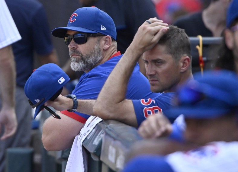 Jul 29, 2021; Chicago, Illinois, USA;  Chicago Cubs manager David Ross (3) looks on during the game against the Cincinnati Reds at Wrigley Field. Mandatory Credit: Matt Marton-USA TODAY Sports