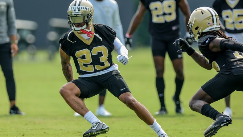 Jul 31, 2021; Metairie, LA, USA; New Orleans Saints cornerback Marshon Lattimore (23) perform defensive drills during a New Orleans Saints training camp session at the New Orleans Saints Training Facility. Mandatory Credit: Stephen Lew-USA TODAY Sports