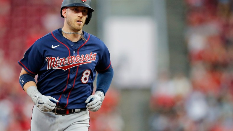 Minnesota Twins catcher Mitch Garver (8) runs the bases on a three-run go-ahead home run in the fifth inning of the MLB Interleague game between the Cincinnati Reds and the Minnesota Twins at Great American Ball Park in downtown Cincinnati on Tuesday, Aug. 3, 2021.

Minnesota Twins At Cincinnati Reds