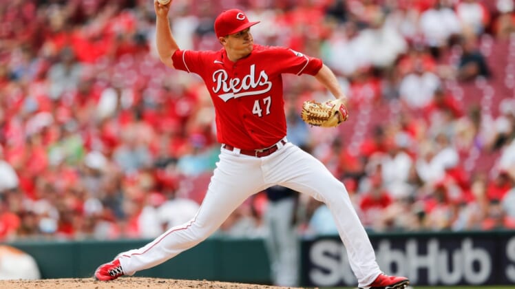Cincinnati Reds relief pitcher Brad Brach (47) delivers the ball in the eighth inning of the MLB Interleague game between the Cincinnati Reds and the Minnesota Twins at Great American Ball Park in downtown Cincinnati on Wednesday, August 4, 2021.Minnesota Twins At Cincinnati Reds