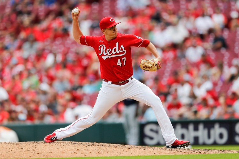 Cincinnati Reds relief pitcher Brad Brach (47) delivers the ball in the eighth inning of the MLB Interleague game between the Cincinnati Reds and the Minnesota Twins at Great American Ball Park in downtown Cincinnati on Wednesday, August 4, 2021.

Minnesota Twins At Cincinnati Reds