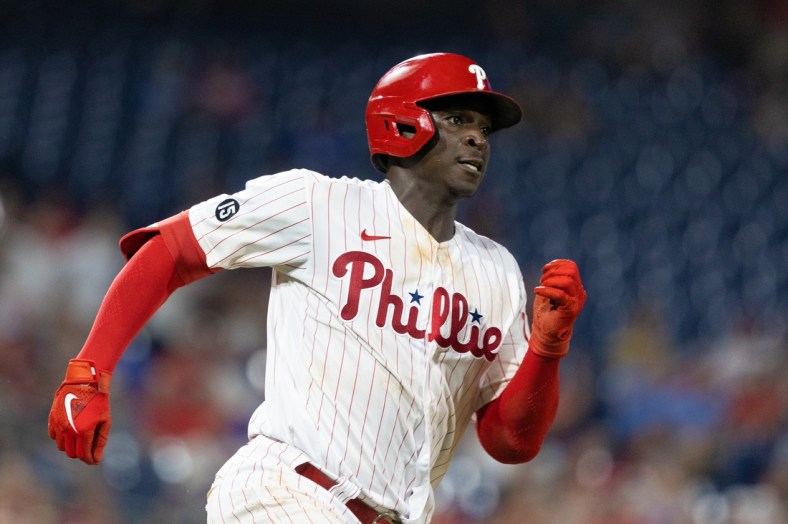 Aug 13, 2021; Philadelphia, Pennsylvania, USA; Philadelphia Phillies shortstop Didi Gregorius (18) runs the bases after hitting a double during the fifth inning against the Cincinnati Reds at Citizens Bank Park. Mandatory Credit: Bill Streicher-USA TODAY Sports