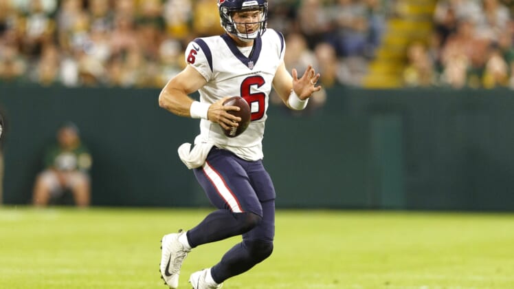 Aug 14, 2021; Green Bay, Wisconsin, USA; Houston Texans quarterback Jeff Driskel (6) rushes with the football during the third quarter against the Green Bay Packers at Lambeau Field. Mandatory Credit: Jeff Hanisch-USA TODAY Sports