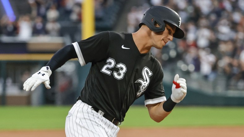 Aug 17, 2021; Chicago, Illinois, USA; Chicago White Sox third baseman Jake Lamb (23) rounds the bases after hitting a three-run home run against the Oakland Athletics during the second inning at Guaranteed Rate Field. Mandatory Credit: Kamil Krzaczynski-USA TODAY Sports