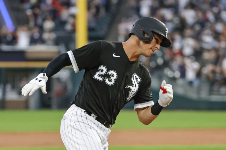 Aug 17, 2021; Chicago, Illinois, USA; Chicago White Sox third baseman Jake Lamb (23) rounds the bases after hitting a three-run home run against the Oakland Athletics during the second inning at Guaranteed Rate Field. Mandatory Credit: Kamil Krzaczynski-USA TODAY Sports
