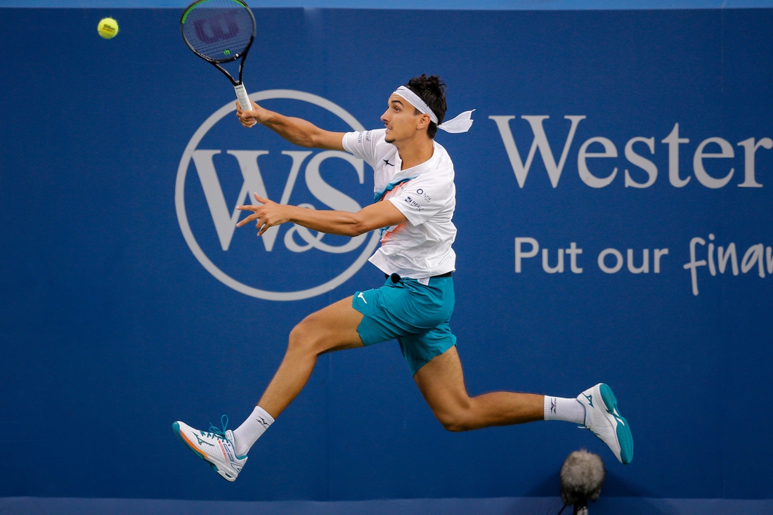 Lorenzo Sonego returns a shot during a match between Lorenzo Sonego (ITA) and Stefanos Tsitsipas (GRE) in the Western & Southern Open at the Lindner Family Tennis Center in Mason, Ohio on Thursday, Aug. 19, 2021. Tsitsipas won 5-7, 6-3, 6-4.