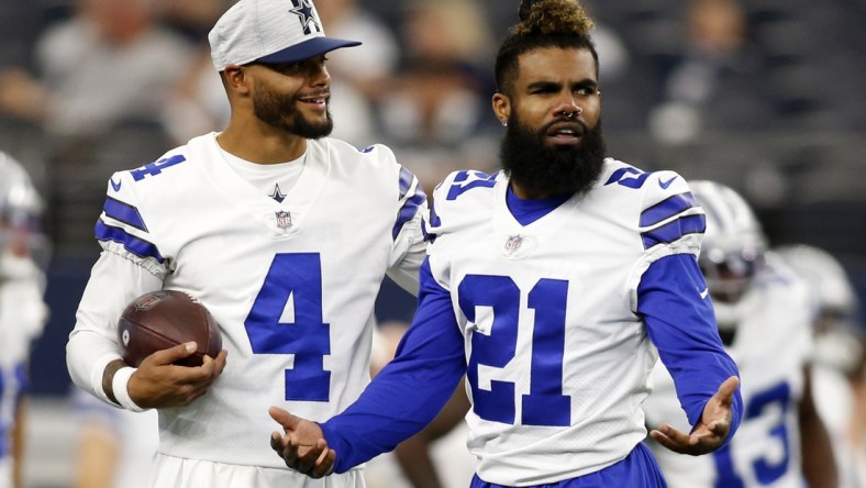 Aug 21, 2021; Arlington, Texas, USA; Dallas Cowboys quarterback Dak Prescott (4) and running back Ezekiel Elliott (21) on the field before the game against the Houston Texans at AT&T Stadium. Mandatory Credit: Tim Heitman-USA TODAY Sports