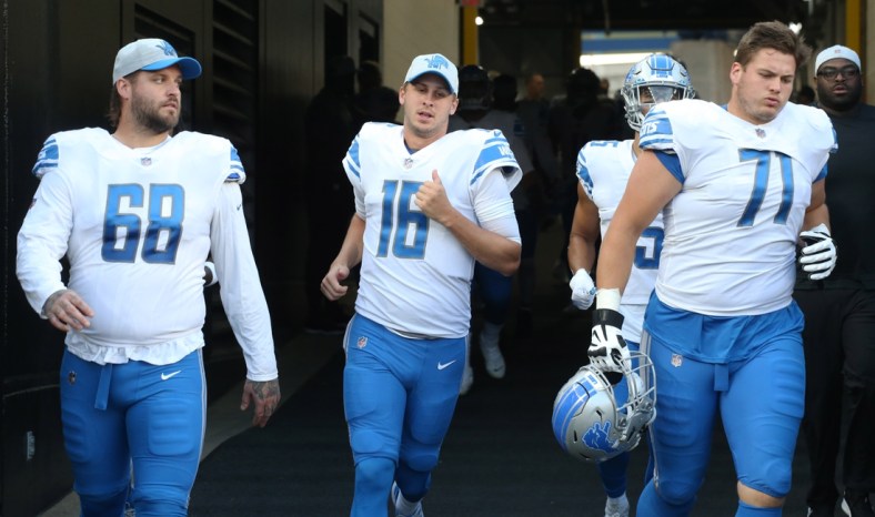 Aug 21, 2021; Pittsburgh, Pennsylvania, USA;  Detroit Lions offensive tackle Taylor Decker (68) and quarterback Jared Goff (16) and offensive guard Logan Stenberg (71) take the field to play the Pittsburgh Steelers at Heinz Field. Mandatory Credit: Charles LeClaire-USA TODAY Sports