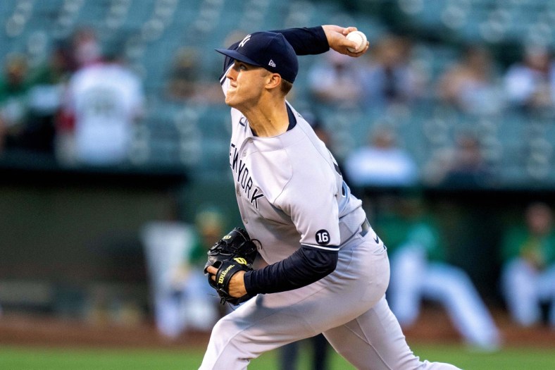 Aug 26, 2021; Oakland, California, USA;  New York Yankees starting pitcher Jameson Taillon (50) delivers against the Oakland Athletics during the first inning at RingCentral Coliseum. Mandatory Credit: Neville E. Guard-USA TODAY Sports