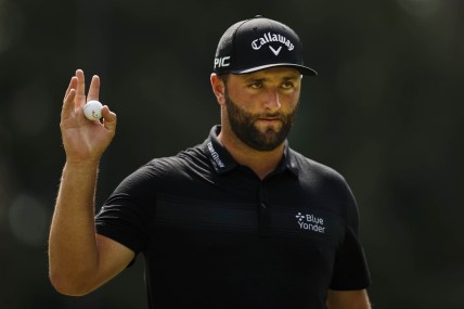 Aug 27, 2021; Owings Mills, Maryland, USA; Jon Rahm waves to fans after sinking his putt on the first hole during the second round of the BMW Championship golf tournament. Mandatory Credit: Scott Taetsch-USA TODAY Sports