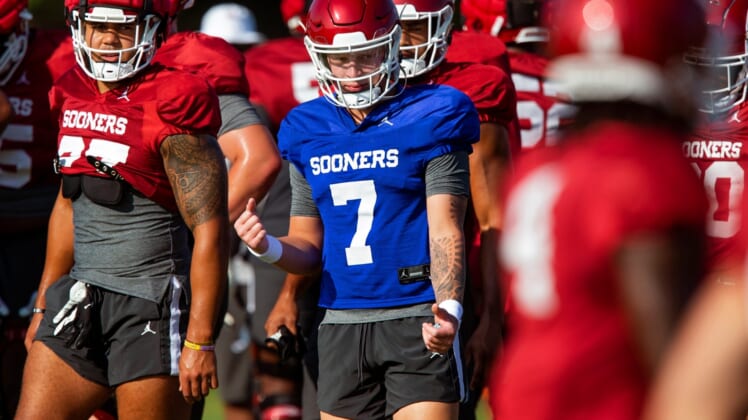 OU quarterback Spencer Rattler (7) enters the 2021 season as the Heisman Trophy favorite on a Sooners team eyeing their first national title since the 2000 season.main