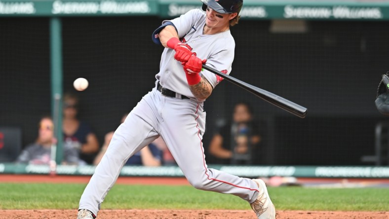 Aug 28, 2021; Cleveland, Ohio, USA; Boston Red Sox center fielder Jarren Duran (40) hits a single during the sixth inning against the Cleveland Indians at Progressive Field. Mandatory Credit: Ken Blaze-USA TODAY Sports