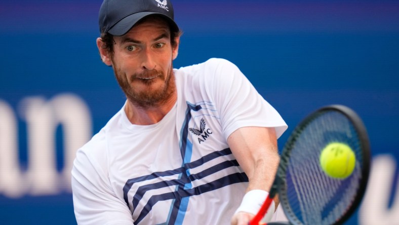 Aug 30, 2021; Flushing, NY, USA; Andy Murray of Great Britain hits to Stefanos Tsitsipas of Greece (not pictured) on day one of the 2021 U.S. Open tennis tournament at USTA Billie King National Tennis Center. Mandatory Credit: Robert Deutsch-USA TODAY Sports