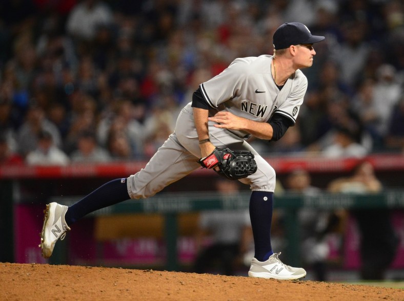 Aug 30, 2021; Anaheim, California, USA; New York Yankees starting pitcher Andrew Heaney (38) throws against the Los Angeles Angels during the sixth inning at Angel Stadium. Mandatory Credit: Gary A. Vasquez-USA TODAY Sports