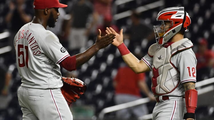 Aug 31, 2021; Washington, District of Columbia, USA; Philadelphia Phillies relief pitcher Enyel De Los Santos (51) is congratulated by catcher Rafael Marchan (12) after recording the final out against the Washington Nationals at Nationals Park. Mandatory Credit: Brad Mills-USA TODAY Sports