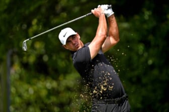 Sep 2, 2021; Atlanta, Georgia, USA; Brooks Koepka plays his shot from the second tee during the first round of the Tour Championship golf tournament. Mandatory Credit: Adam Hagy-USA TODAY Sports