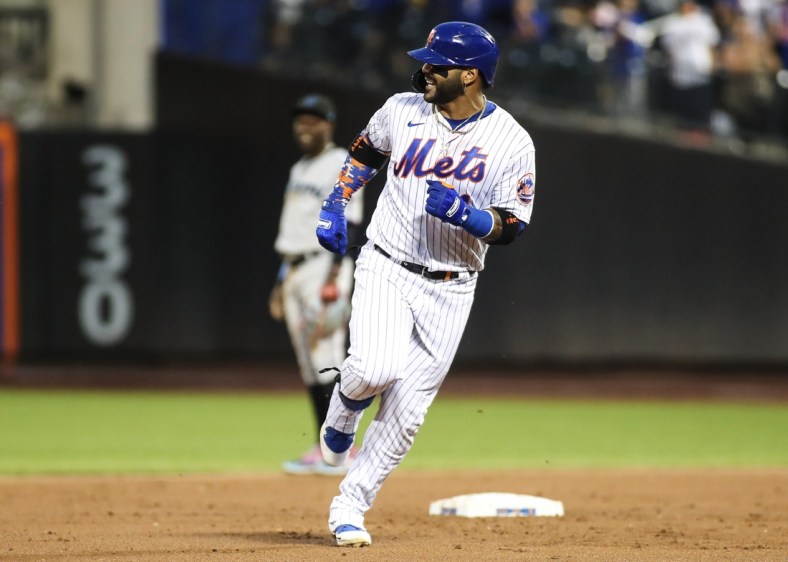 Sep 2, 2021; New York City, New York, USA;  New York Mets third baseman Jonathan Villar (1) rounds second base after hitting a leadoff home run in the first inning against the Miami Marlins at Citi Field. Mandatory Credit: Wendell Cruz-USA TODAY Sports