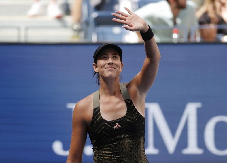 Sep 3, 2021; Flushing, NY, USA; Garbine Muguruza of Spain celebrates after recording match point against Victoria Azarenka of Belarus in a third round match on day five of the 2021 U.S. Open tennis tournament at USTA Billie Jean King National Tennis Center. Mandatory Credit: Jerry Lai-USA TODAY Sports