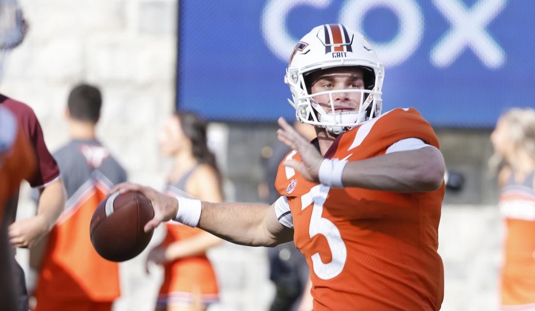 Sep 3, 2021; Blacksburg, Virginia, USA;  Virginia Tech Hokies quarterback Braxton Burmeister (3)throws a warmup pass before the game against the North Carolina Tar Heels at Lane Stadium. Mandatory Credit: Reinhold Matay-USA TODAY Sports