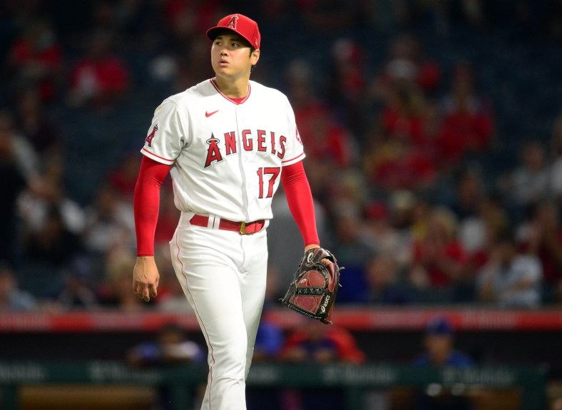 September 3, 2021; Anaheim, California, USA; Los Angeles Angels starting pitcher Shohei Ohtani (17) reacts following the top of the third inning against the Texas Rangers at Angel Stadium. Mandatory Credit: Gary A. Vasquez-USA TODAY Sports