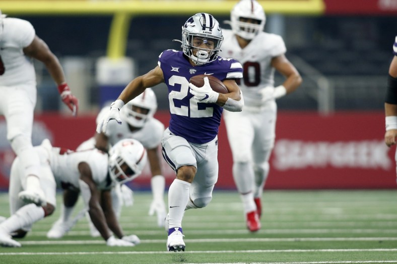 Sep 4, 2021; Arlington, Texas, USA;  Kansas State Wildcats running back Deuce Vaughn (22) runs for a touchdown in the second quarter against the Stanford Cardinal at AT&T Stadium. Mandatory Credit: Tim Heitman-USA TODAY Sports