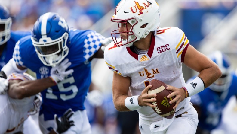 Sep 4, 2021; Lexington, Kentucky, USA; Louisiana Monroe Warhawks quarterback Rhett Rodriguez (4) carries the ball during the second quarter against the Kentucky Wildcats at Kroger Field. Mandatory Credit: Jordan Prather-USA TODAY Sports