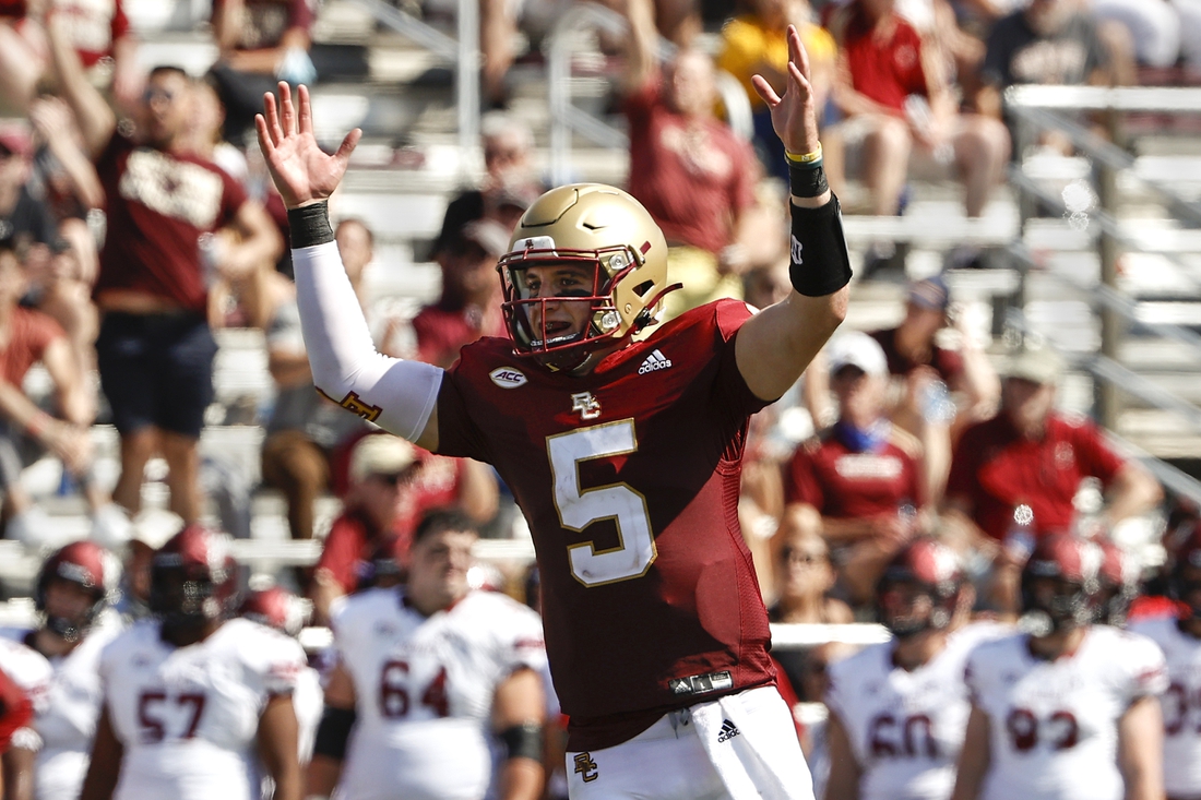 Sep 4, 2021; Chestnut Hill, Massachusetts, USA; Boston College Eagles quarterback Phil Jurkovec (5) celebrates a touchdown against the Colgate Raiders during the second half at Alumni Stadium. Mandatory Credit: Winslow Townson-USA TODAY Sports