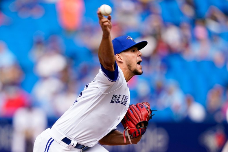 Sep 4, 2021; Toronto, Ontario, CAN; Toronto Blue Jays starting pitcher Jose Berrios (17) pitches to the Oakland Athletics during the first inning at Rogers Centre. Mandatory Credit: Kevin Sousa-USA TODAY Sports