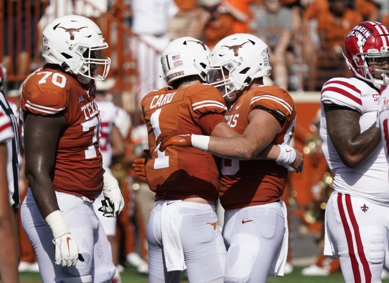 Sep 4, 2021; Austin, Texas, USA; Texas Longhorns tight end Cade Brewer (80) hugs quarterback Hudson Card (1) after catching a touchdown pass in the first half of the game against the Louisiana Ragin' Cajuns at Darrell K Royal-Texas Memorial Stadium. Mandatory Credit: Scott Wachter-USA TODAY Sports