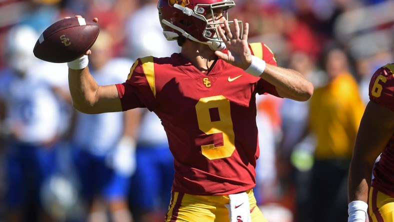 Sep 4, 2021; Los Angeles, California, USA;   USC Trojans quarterback Kedon Slovis (9) sets to pass in the first half of the game against the San Jose State Spartans at United Airlines Field at Los Angeles Memorial Coliseum. Mandatory Credit: Jayne Kamin-Oncea-USA TODAY Sports