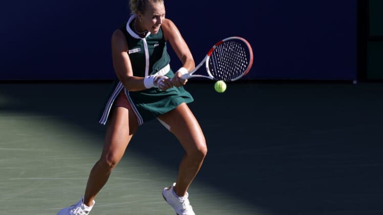 Sep 4, 2021; Flushing, NY, USA; Anett Kontaveit of Estonia hits a backhand against Iga Swiatek of Poland (not pictured) on day six of the 2021 U.S. Open tennis tournament at USTA Billie Jean King National Tennis Center. Mandatory Credit: Geoff Burke-USA TODAY Sports