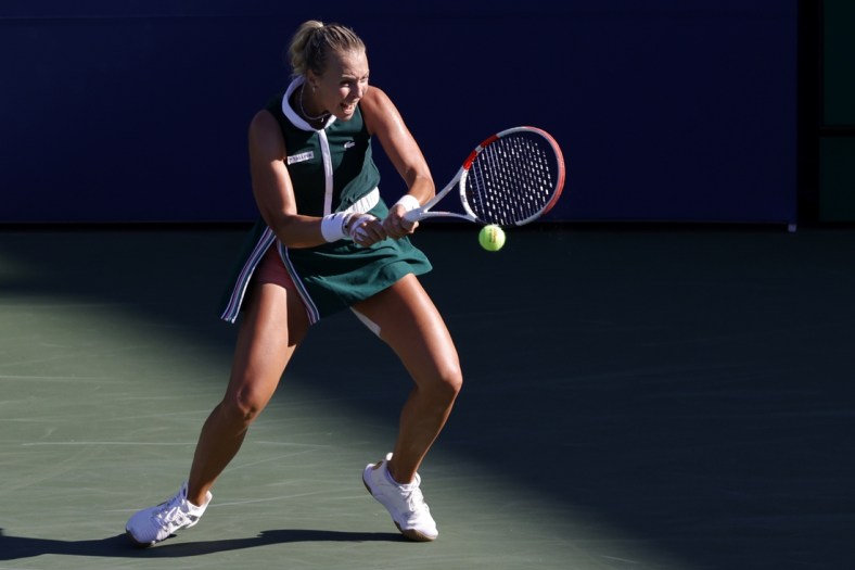 Sep 4, 2021; Flushing, NY, USA; Anett Kontaveit of Estonia hits a backhand against Iga Swiatek of Poland (not pictured) on day six of the 2021 U.S. Open tennis tournament at USTA Billie Jean King National Tennis Center. Mandatory Credit: Geoff Burke-USA TODAY Sports