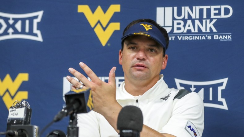 Sep 4, 2021; College Park, Maryland, USA; West Virginia Mountaineers head coach Neal Brown talks to the media after a loss to the Maryland Terrapins at Capital One Field at Maryland Stadium. Mandatory Credit: Ben Queen-USA TODAY Sports