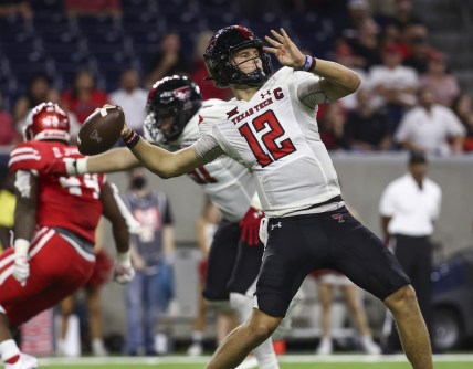 Sep 4, 2021; Houston, Texas, USA; Texas Tech Red Raiders quarterback Tyler Shough (12) attempts a pass during the fourth quarter against the Houston Cougars at NRG Stadium. Mandatory Credit: Troy Taormina-USA TODAY Sports