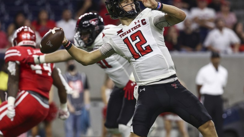 Sep 4, 2021; Houston, Texas, USA; Texas Tech Red Raiders quarterback Tyler Shough (12) attempts a pass during the fourth quarter against the Houston Cougars at NRG Stadium. Mandatory Credit: Troy Taormina-USA TODAY Sports