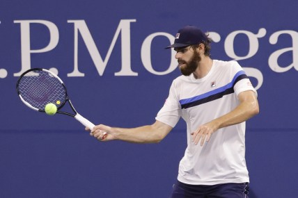 Sep 4, 2021; Flushing, NY, USA; Reilly Opelka of the United States hits a forehand against Nikoloz Basilashvili of Georgia (not pictured) on day six of the 2021 U.S. Open tennis tournament at USTA Billie Jean King National Tennis Center. Mandatory Credit: Geoff Burke-USA TODAY Sports