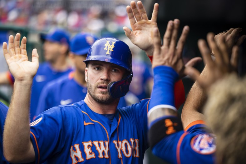 Sep 5, 2021; Washington, District of Columbia, USA; New York Mets first baseman Pete Alonso #20 celebrates after scoring a run against the Washington Nationals during the first inning at Nationals Park. Mandatory Credit: Scott Taetsch-USA TODAY Sports