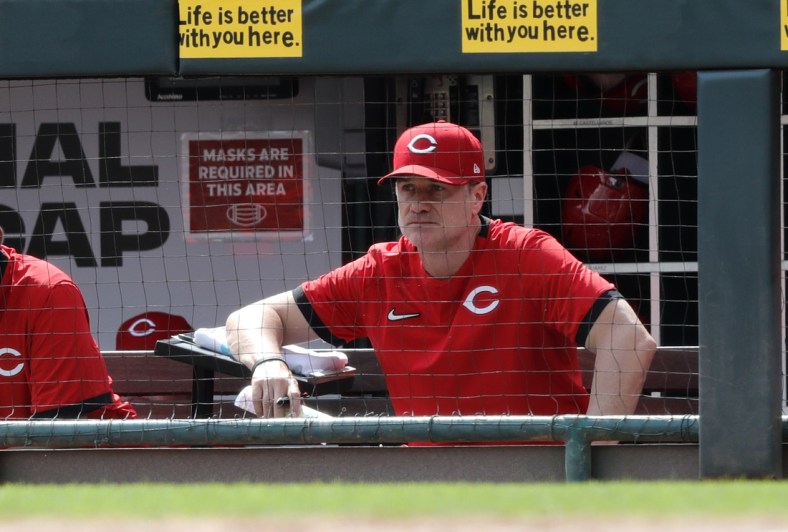 Sep 5, 2021; Cincinnati, Ohio, USA; Cincinnati Reds manager David Bell (25) watches from the dugout during a game against the Detroit Tigers at Great American Ball Park. Mandatory Credit: David Kohl-USA TODAY Sports