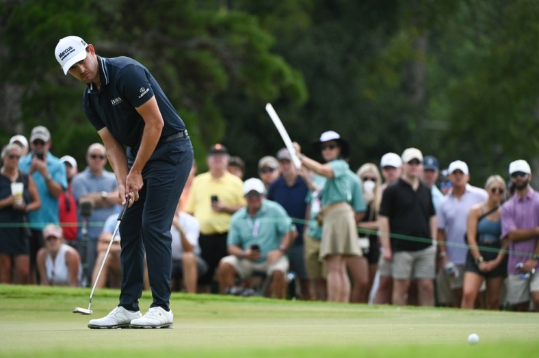 Sep 5, 2021; Atlanta, Georgia, USA; Patrick Cantlay putts on the 7th hole during the final round of the Tour Championship golf tournament. Mandatory Credit: Adam Hagy-USA TODAY Sports